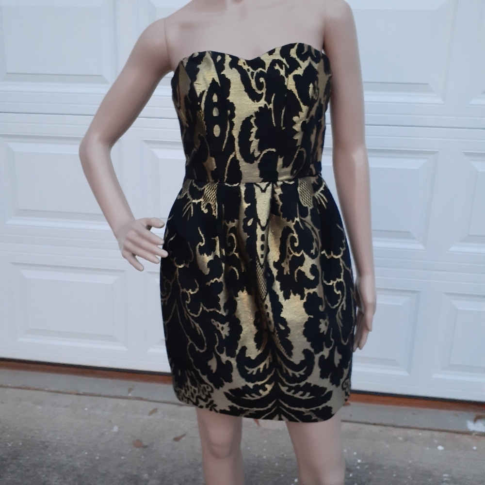 H&M black and gold strapless mini dress